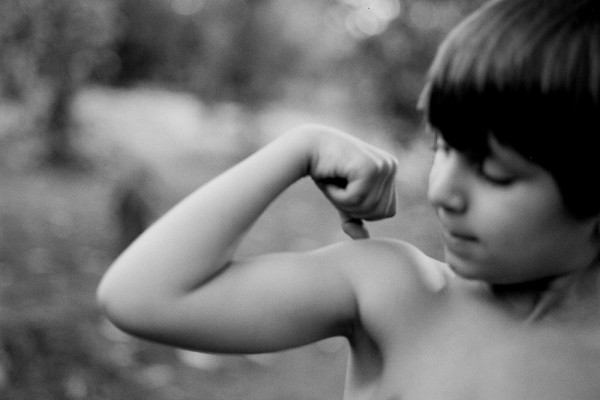 strong kid, making fist, motherhood