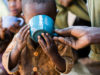 philippe-and-sabines-son-tasting-his-first-cup-of-coffee