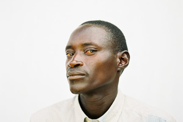 Close-up portrait of a Burundian coffee farmer