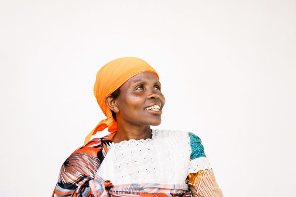 Portrait of Emilienne, a Burundian coffee farmer, from the series "Before + Now".